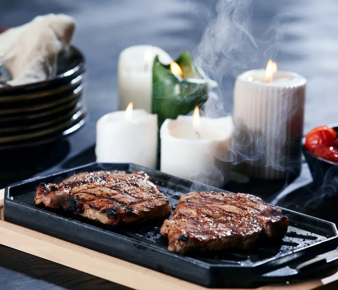 Cozze gusseiserne Pfanne mit Untersetzer, ca. B16,5/H4/T33 cm